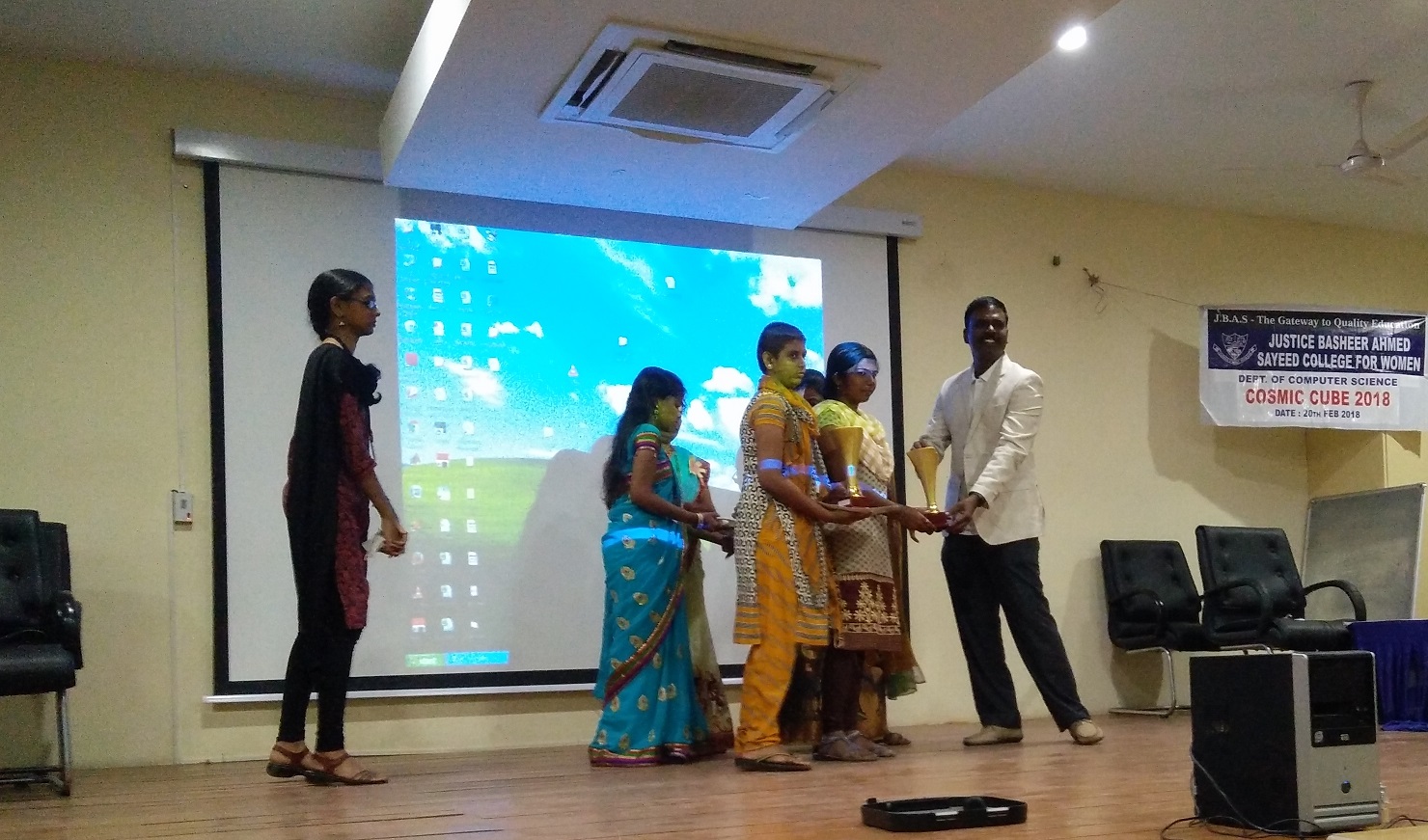 Godwin Stanislaus, Digital Transformation Expert, distributing prizes
