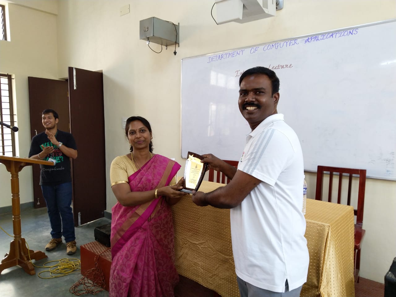 MCC, Dept of CS, HoD, presenting memento to Godwin Stanislaus of Diverse Brains Life Solutions